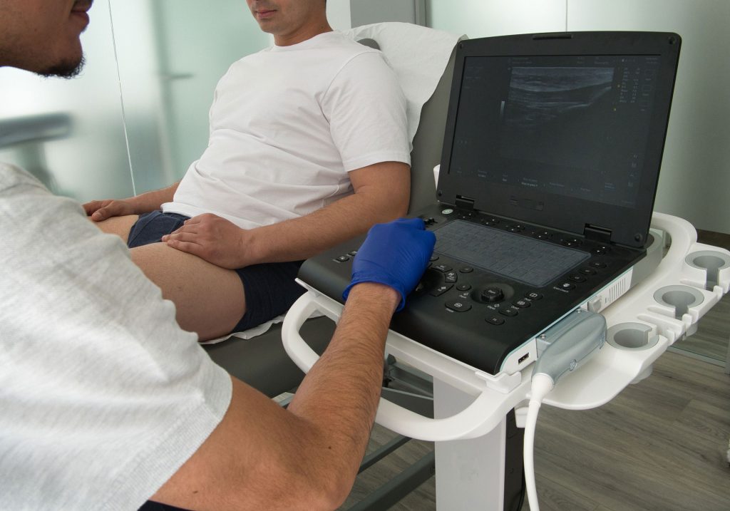 Male patient having an ultrasound.