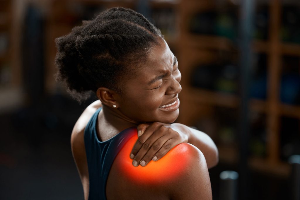 Beautiful woman with shoulder pain.