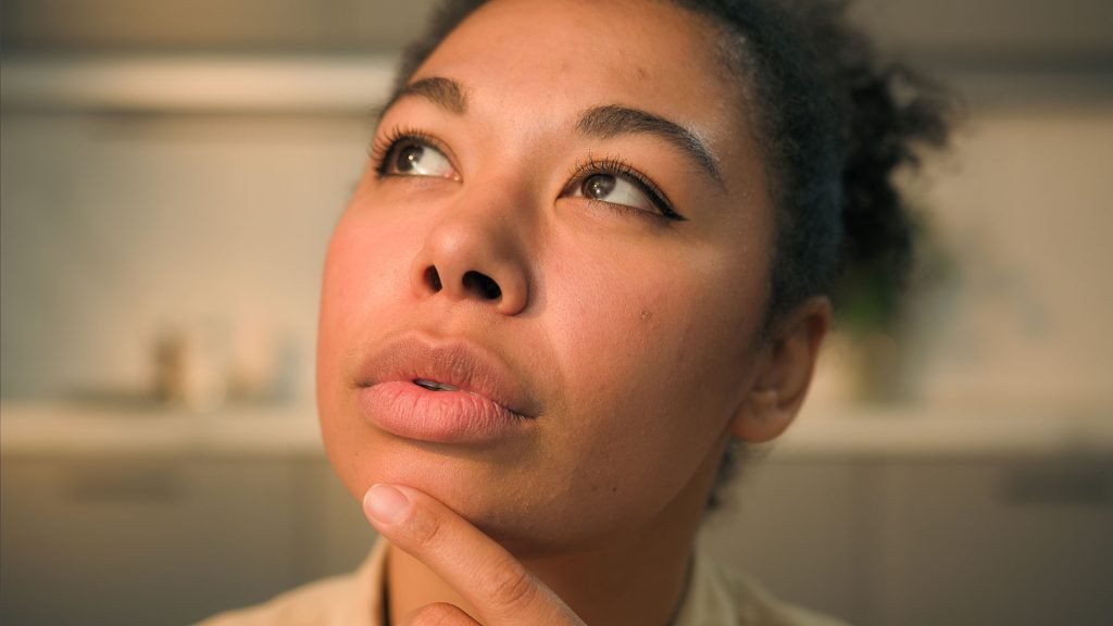 Curious thinking woman.