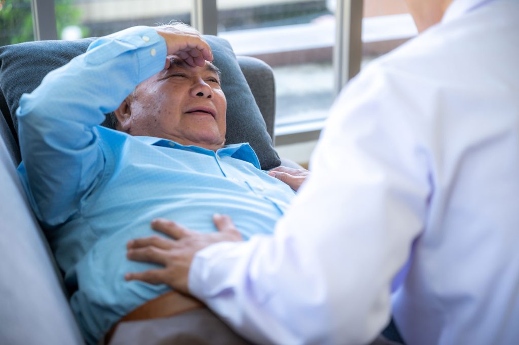 Senior patient visits doctor.