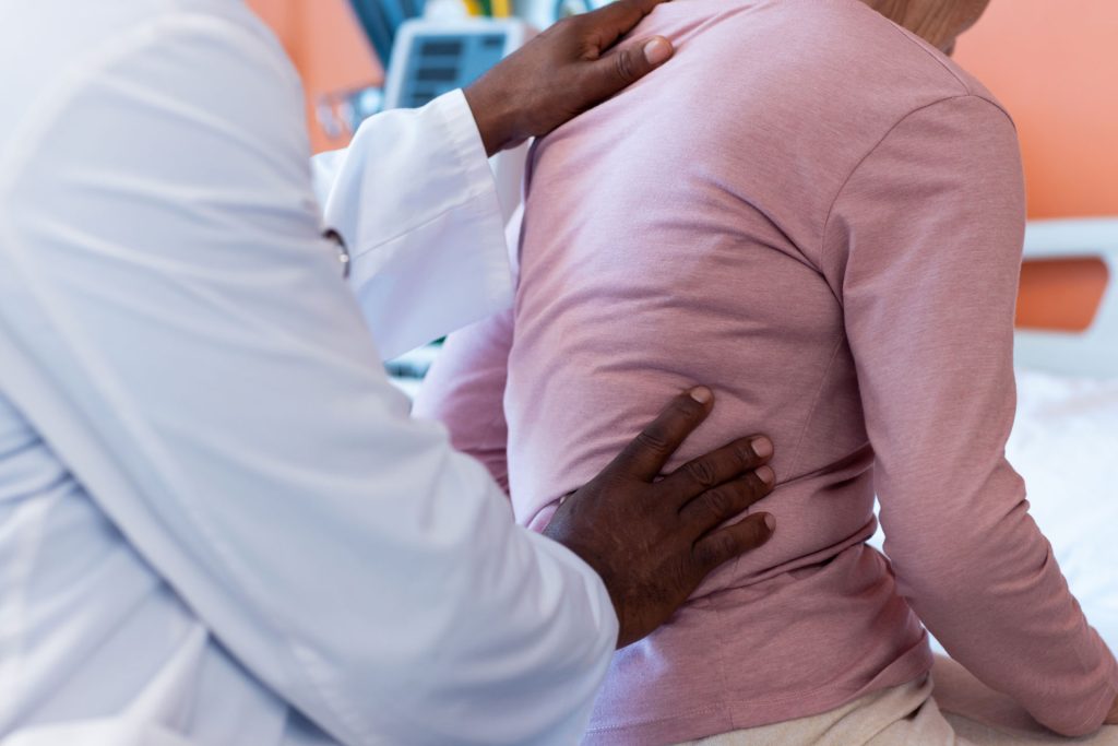 Patient having a check up for back pain.