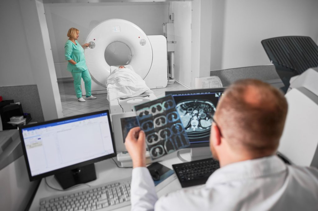 Doctor doing an MRI or Brain Scan.