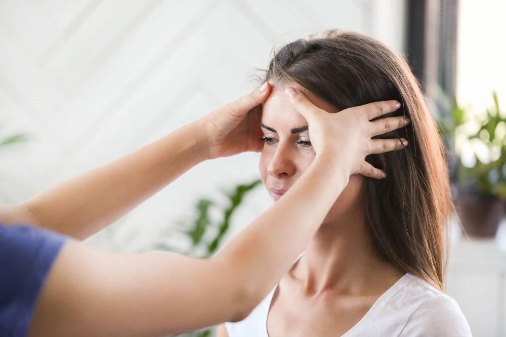 Woman with headache.