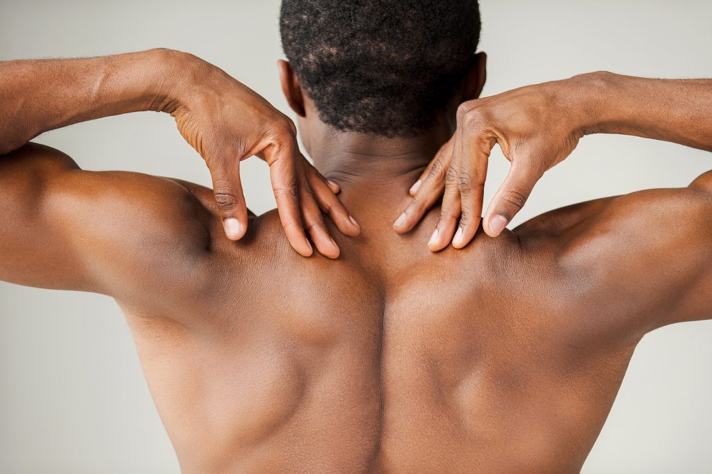 Muscular back of black man.